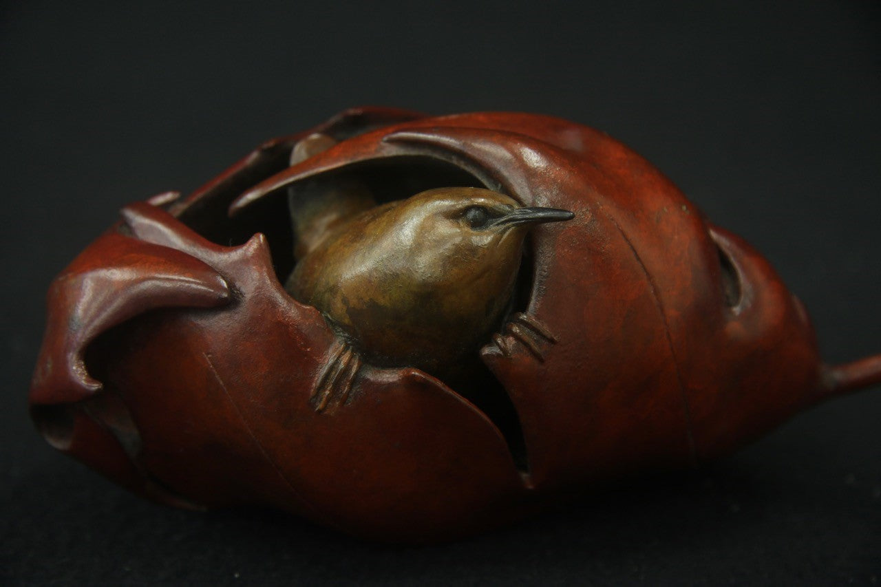 Bronze sculpture wren in maple leaf Adam Binder