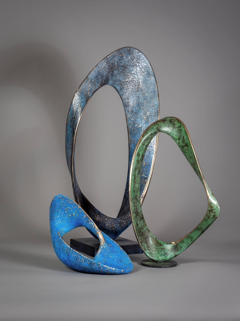 Adam Paddon bronze colour abstract sculptures 
